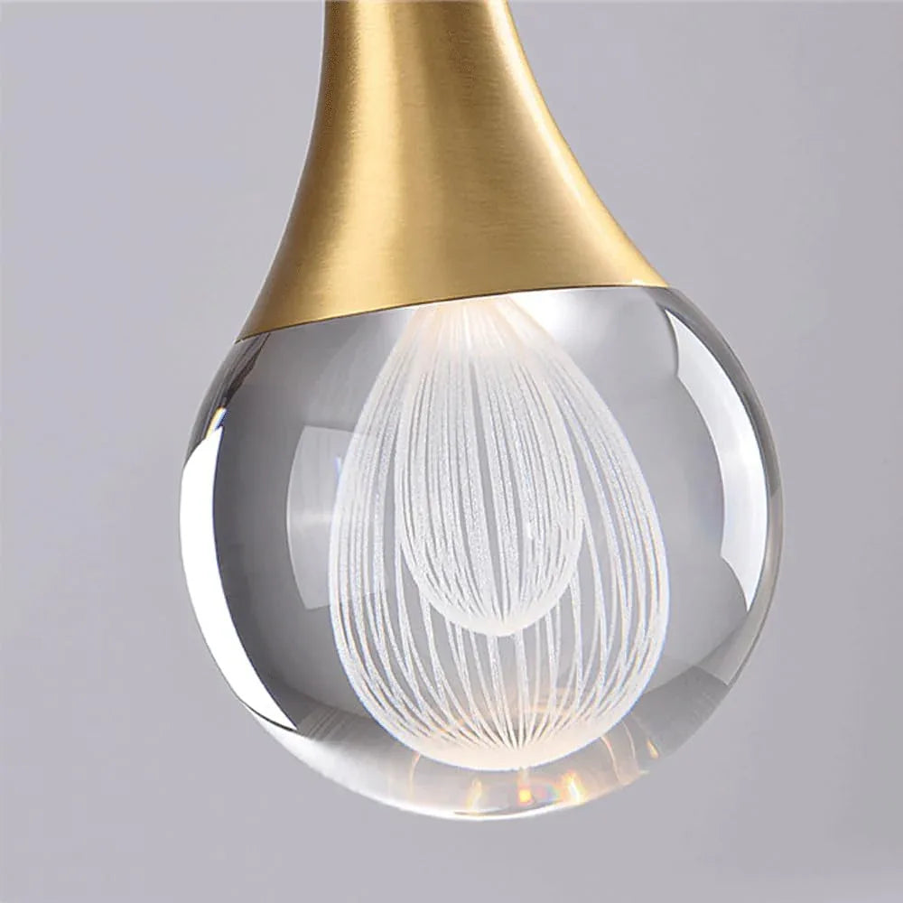 Audara-4-inch Modern Minimalist Crystal Pendant Light Fixture in Teardrop Shape, Suitable for Various Spaces Such As Bedrooms, Kitchen Islands, Dining Rooms, Hotels, Bars, and Cafes.