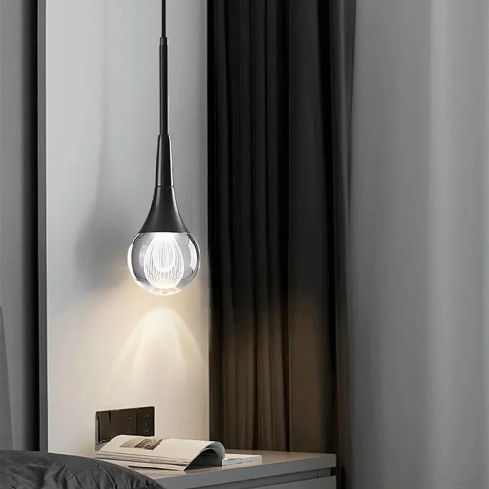 Audara-4-inch Modern Minimalist Crystal Pendant Light Fixture in Teardrop Shape, Suitable for Various Spaces Such As Bedrooms, Kitchen Islands, Dining Rooms, Hotels, Bars, and Cafes.