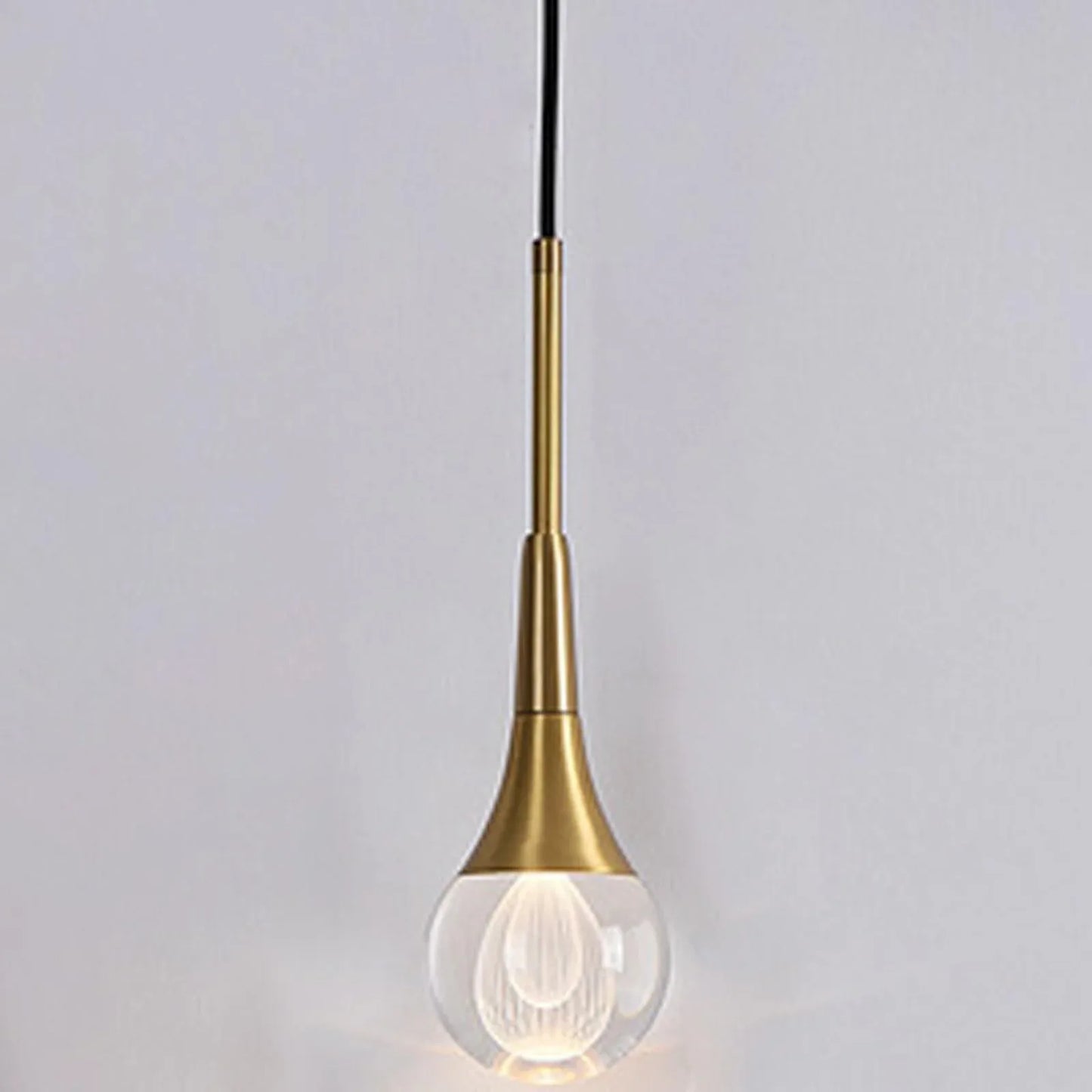 Audara-4-inch Modern Minimalist Crystal Pendant Light Fixture in Teardrop Shape, Suitable for Various Spaces Such As Bedrooms, Kitchen Islands, Dining Rooms, Hotels, Bars, and Cafes. A