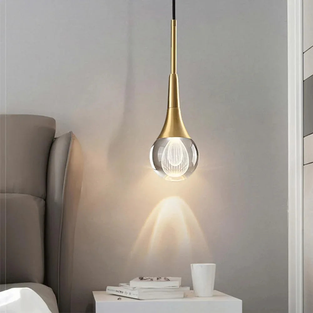 Audara-4-inch Modern Minimalist Crystal Pendant Light Fixture in Teardrop Shape, Suitable for Various Spaces Such As Bedrooms, Kitchen Islands, Dining Rooms, Hotels, Bars, and Cafes.