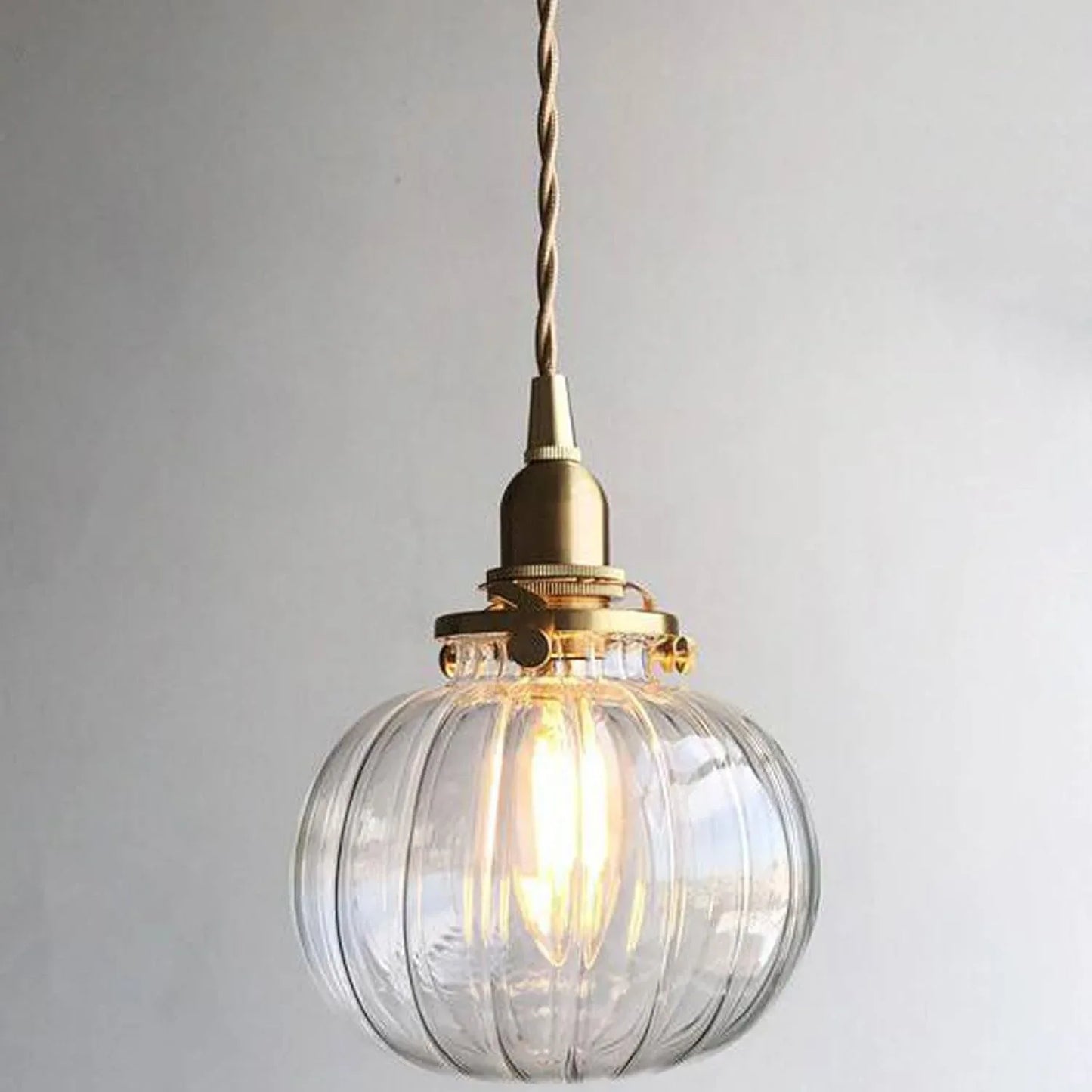Audara-5-inch Spherical Glass Pendant Lights for Bedrooms, Featuring A Modern, Minimalist Luxury Style. Suitable for Various Spaces Including Hotels, Kitchen Islands, Entryways, and Cafes.